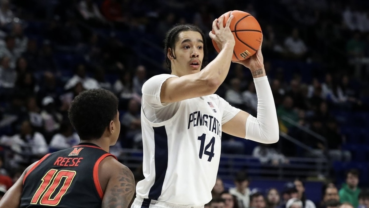 Penn State Nittany Lions forward Yanic Konan Niederhauser (14) looks to pass the ball as Maryland Terrapins forward Julian Reese (10) defends during the first half at Bryce Jordan Center.