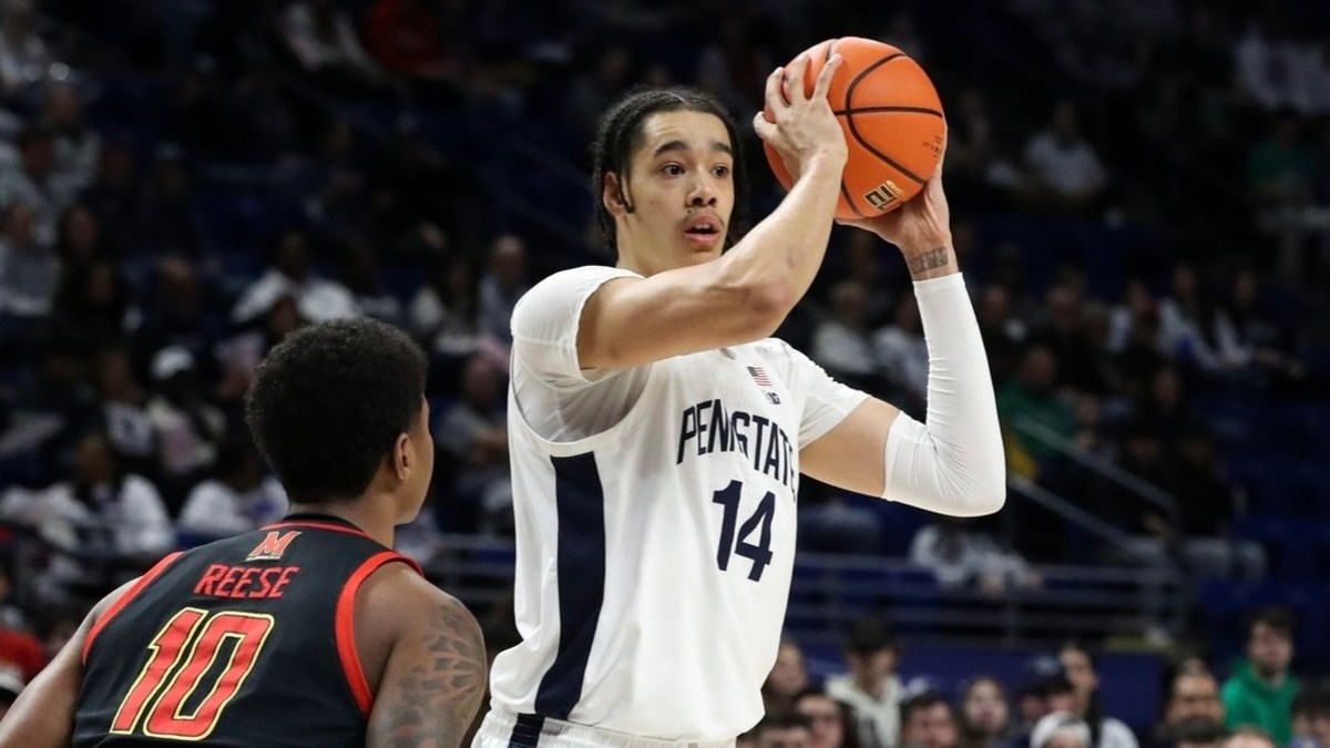 Penn State Nittany Lions forward Yanic Konan Niederhauser (14) looks to pass the ball as Maryland Terrapins forward Julian Reese (10) defends during the first half at Bryce Jordan Center.