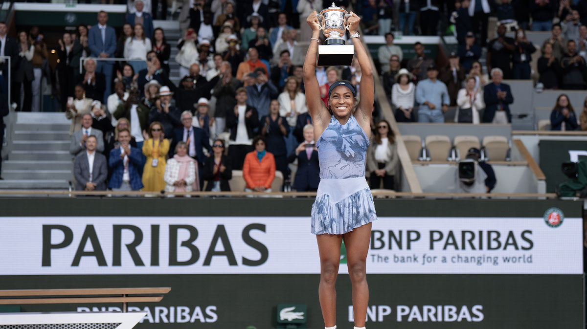 Coco Gauff of the United States lifts the trophy after winning the women’s singles final against Aryna Sabalenka on day 14 at Roland Garros Stadium.