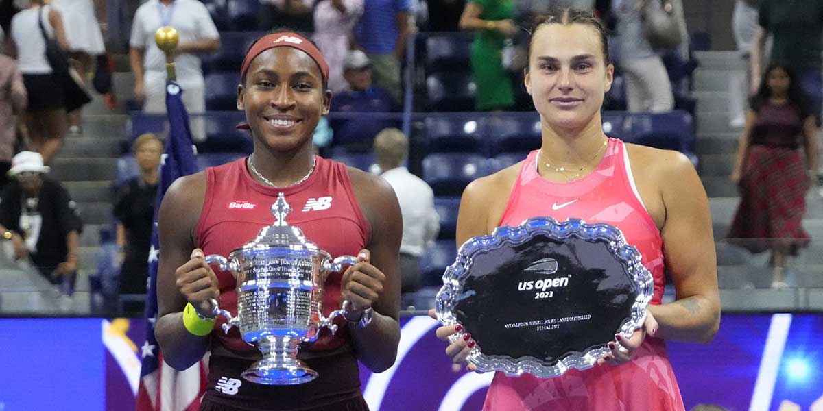 Coco Gauff of the United States and Aryna Sabalenka celebrate with the championship and finalist trophies, respectively, after their match in the women's singles finalon day thirteen of the 2023 U.S. Open tennis tournament at USTA Billie Jean King Tennis Center.