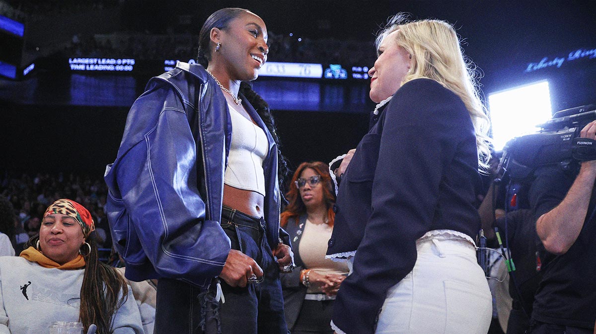 Professional tennis player Coco Gauff (l) talks with ESPN reporter Holly Rowe in the fourth quarter of the game between the Chicago Sky and the New York Liberty at Barclays Center. Mandatory Credit: