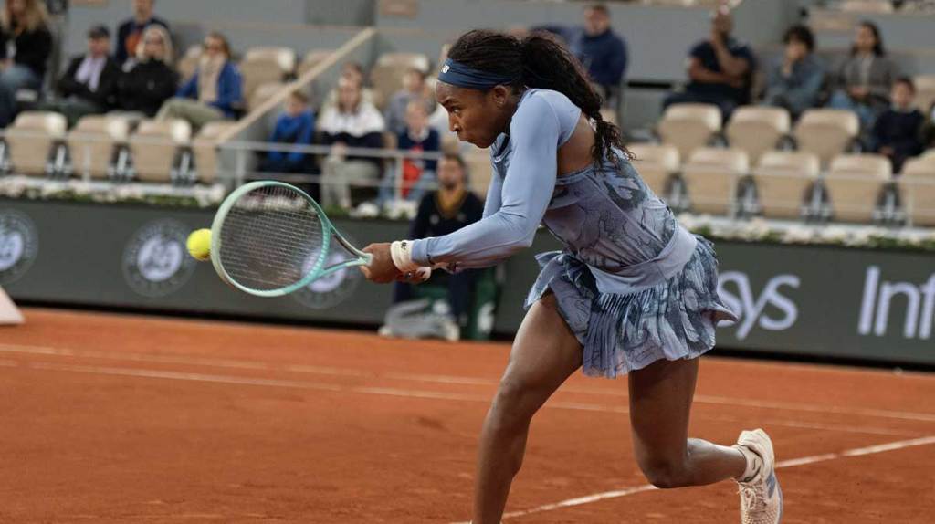 Coco Gauff of the United States returns a shot during her match against Madison Keys of the United States on day 11.
