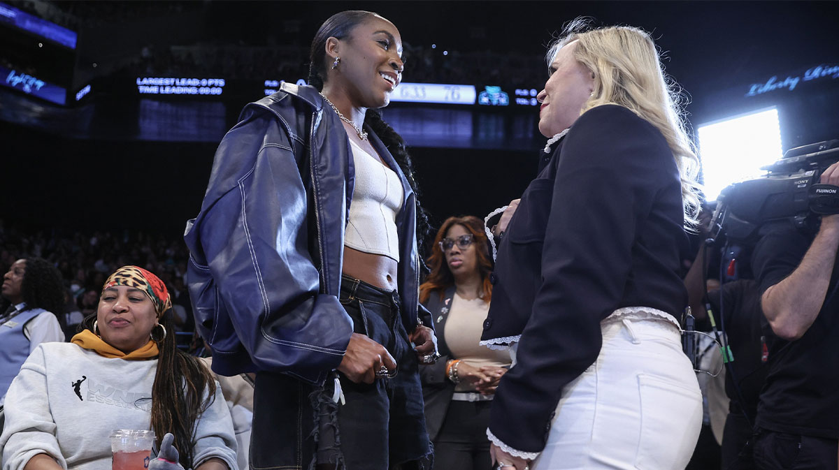 Coco Gauff (l) talks with ESPN reporter Holly Rowe in the fourth quarter of the game between the Chicago Sky and the New York Liberty at Barclays Center.
