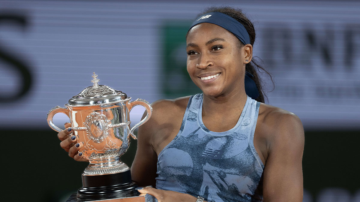 Coco Gauff of the United States poses with the trophy after winning the women’s singles final against Aryna Sabalenka on day 14 at Roland Garros Stadium.