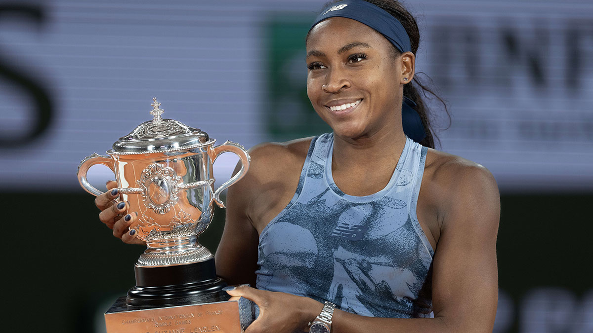 Coco Gauff of the United States poses with the trophy after winning the women’s singles final against Aryna Sabalenka on day 14 at Roland Garros Stadium.