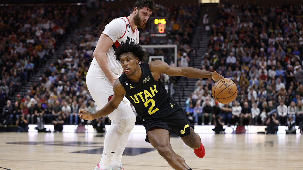 Dec 3, 2022; Salt Lake City, Utah, USA; Utah Jazz guard Collin Sexton (2) drives against Portland Trail Blazers center Jusuf Nurkic (27) in the second half at Vivint Arena. Mandatory Credit: Jeffrey Swinger-Imagn Images