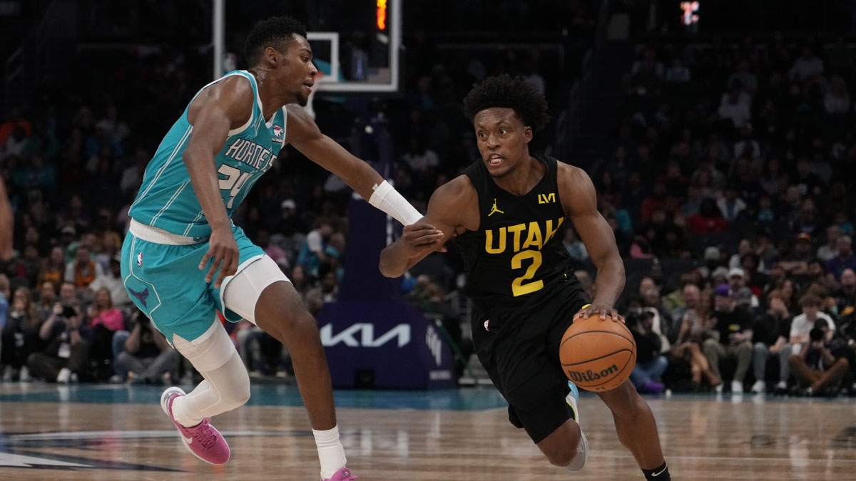 Utah Jazz guard Collin Sexton (2) handles the ball against Charlotte Hornets forward Brandon Miller (24) during the second half at Spectrum Center.