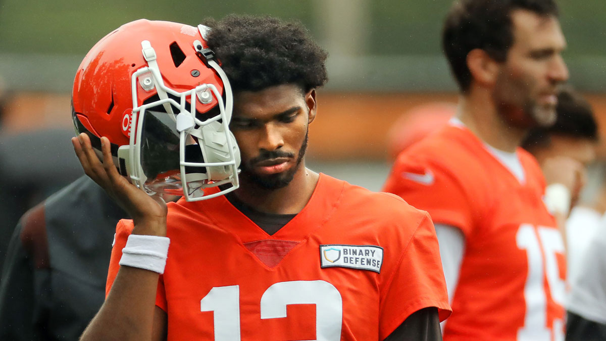 Cleveland Browns quarterback Shedeur Sanders (12) listens to the play calling on the sideline during an NFL practice at the Cleveland Browns training facility on Wednesday, May 28, 2025, in Berea, Ohio.