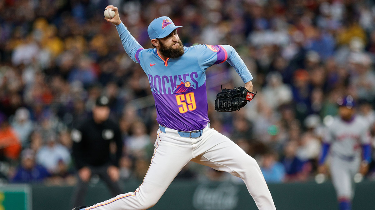 Colorado Rockies relief pitcher Jake Bird (59) pitches in the sixth inning against the New York Mets at Coors Field.