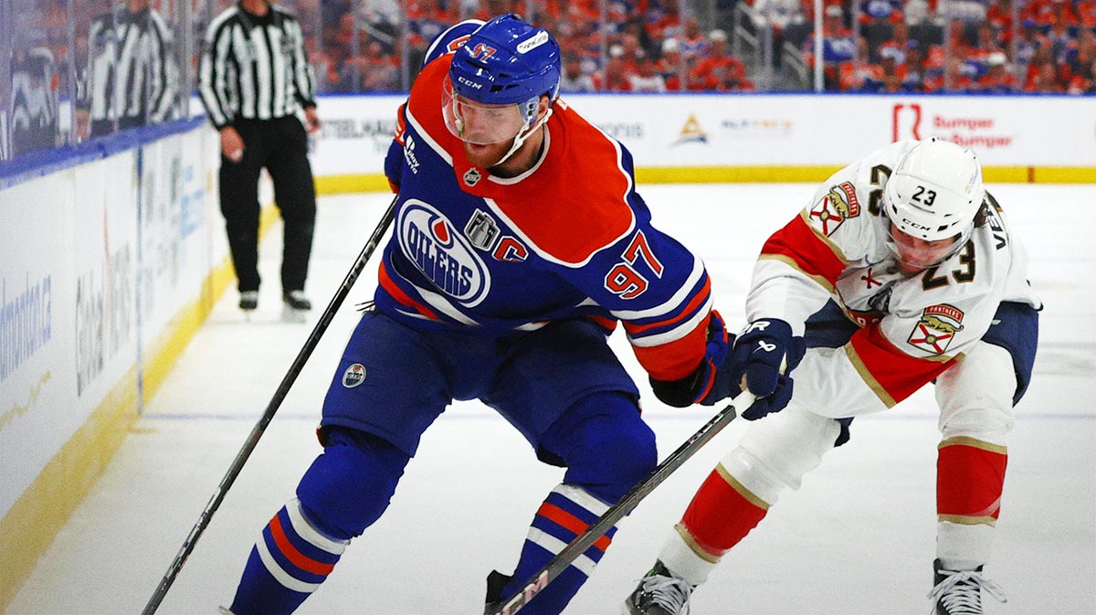 Edmonton Oilers center Connor McDavid (97) skates past Florida Panthers center Carter Verhaeghe (23) during the third period in game two of the 2025 Stanley Cup Final at Rogers Place.