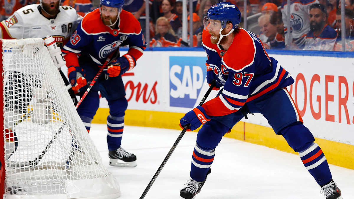 Edmonton Oilers center Connor McDavid (97) skates with the puck against the Florida Panthers in the third period in game one of the 2025 Stanley Cup Final at Rogers Place.