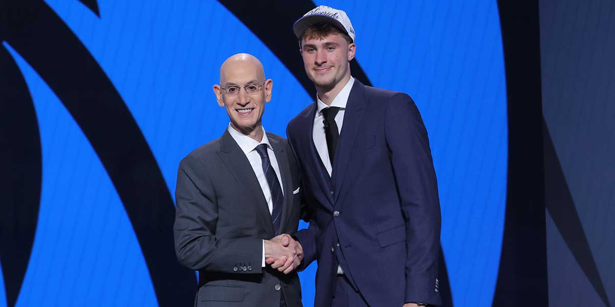Cooper Flagg poses with NBA commissioner Adam Silver after being selected as first overall by the Dallas Mavericks in the first round of the 2025 NBA Draft at Barclays Center.