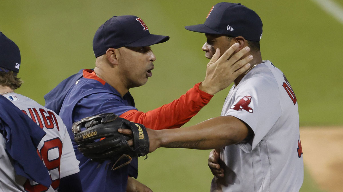 Oct 3, 2021; Washington, District of Columbia, USA; Boston Red Sox manager Alex Cora (L) celebrates with Red Sox third baseman Rafael Devers (11) after clinching a Wild Card berth after their game against the Washington Nationals at Nationals Park. Mandatory Credit: Geoff Burke-Imagn Images at Nationals Park.