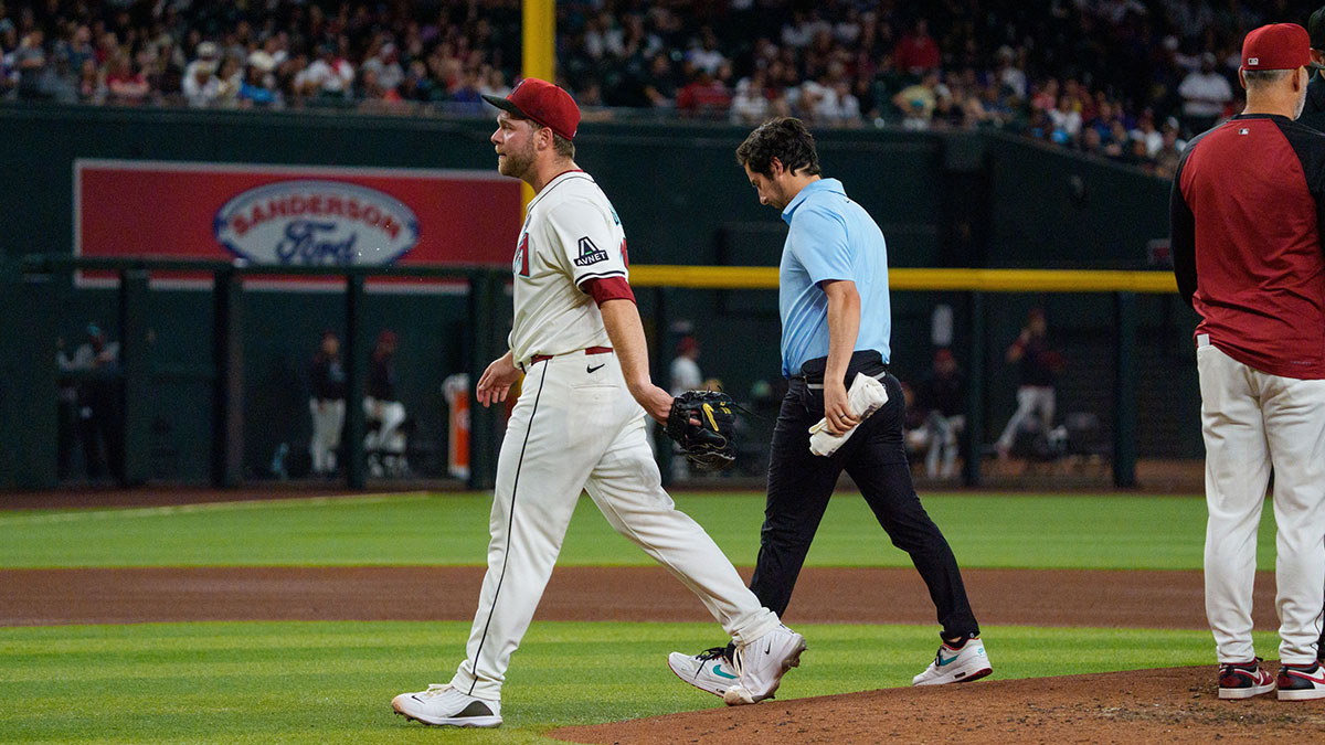 Arizona Diamondbacks starting pitcher Corbin Burnes (39) reacts after an injury in the fith inning and leaves the field against the Washington Nationals at Chase Field.