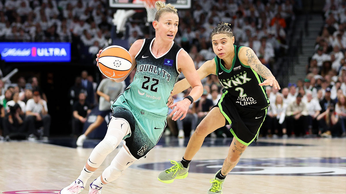 New York Liberty guard Courtney Vandersloot (22) drives past Minnesota Lynx guard Natisha Hiedeman (2) during the second half of game four of the 2024 WNBA Finals at Target Center.