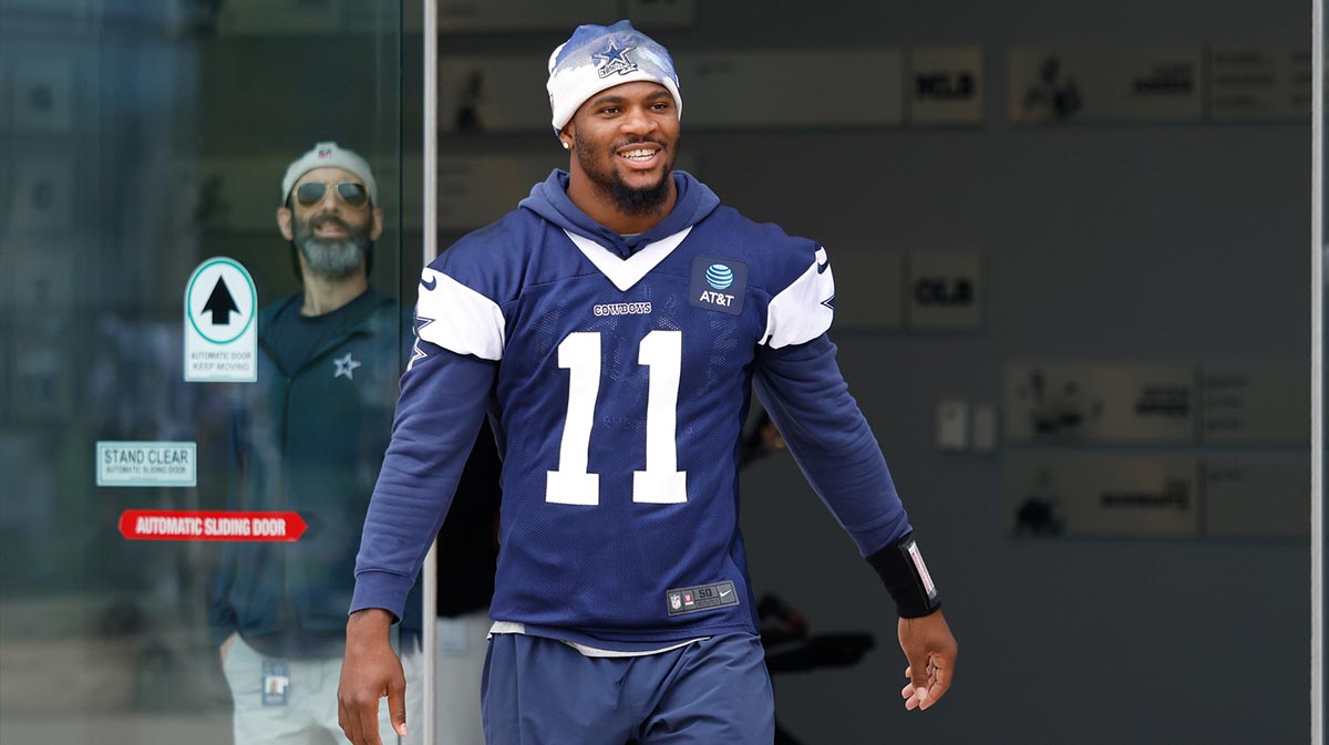 Dallas Cowboys defensive end Micah Parsons (11) walks onto the practice field at the Ford Center at the Star Training Facility in Frisco, Texas.
