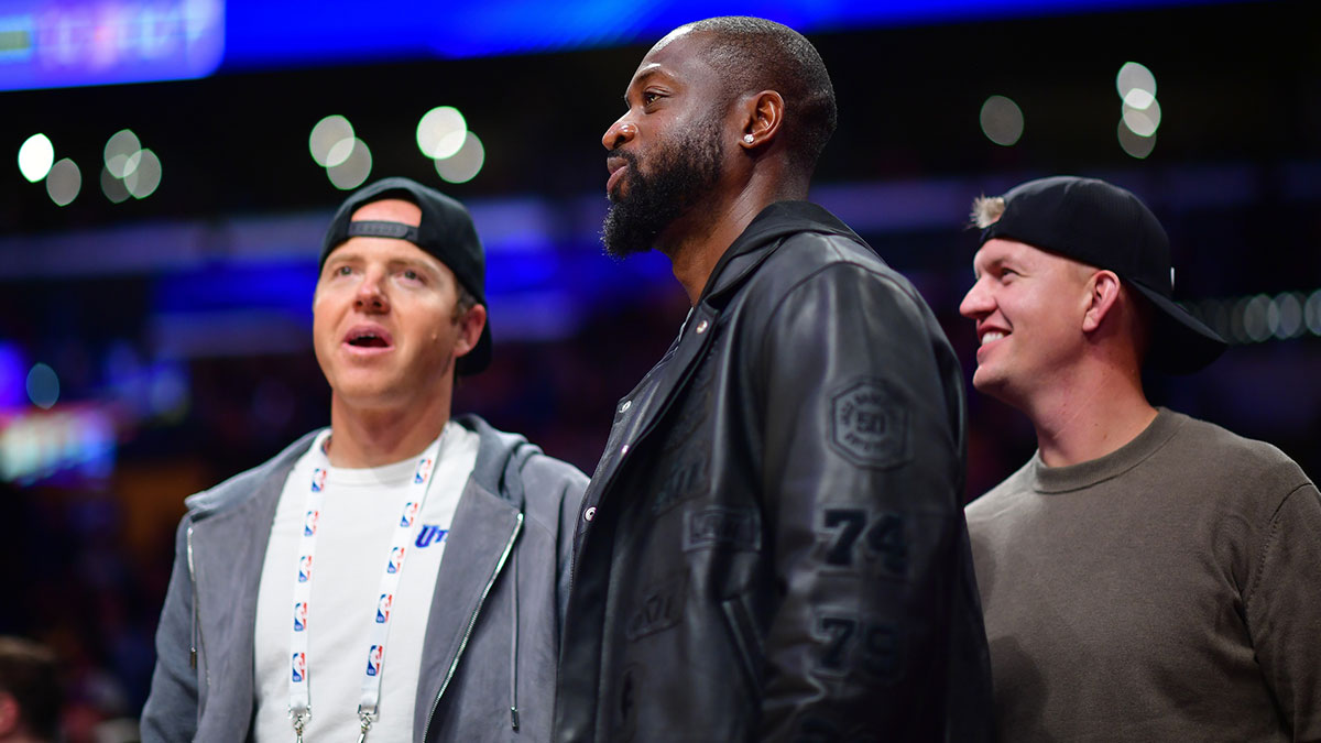Utah Jazz minority owner Dwyane Wade with majority owner Ryan Smith (left) watch game action against the Los Angeles Lakers during the second half at Crypto.com Arena.