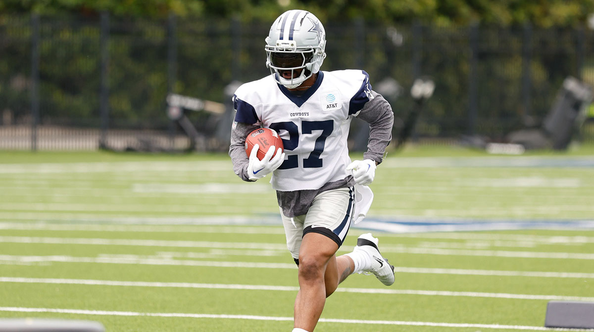 Dallas Cowboys running back Miles Sanders (27) goes through a drill during practice at the Ford Center at the Star Training Facility in Frisco, Texas.
