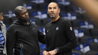 Dallas Mavericks general manager Nico Harrison (right) looks on during warms up before the game between the Dallas Mavericks and the Memphis Grizzlies at the American Airlines Center.