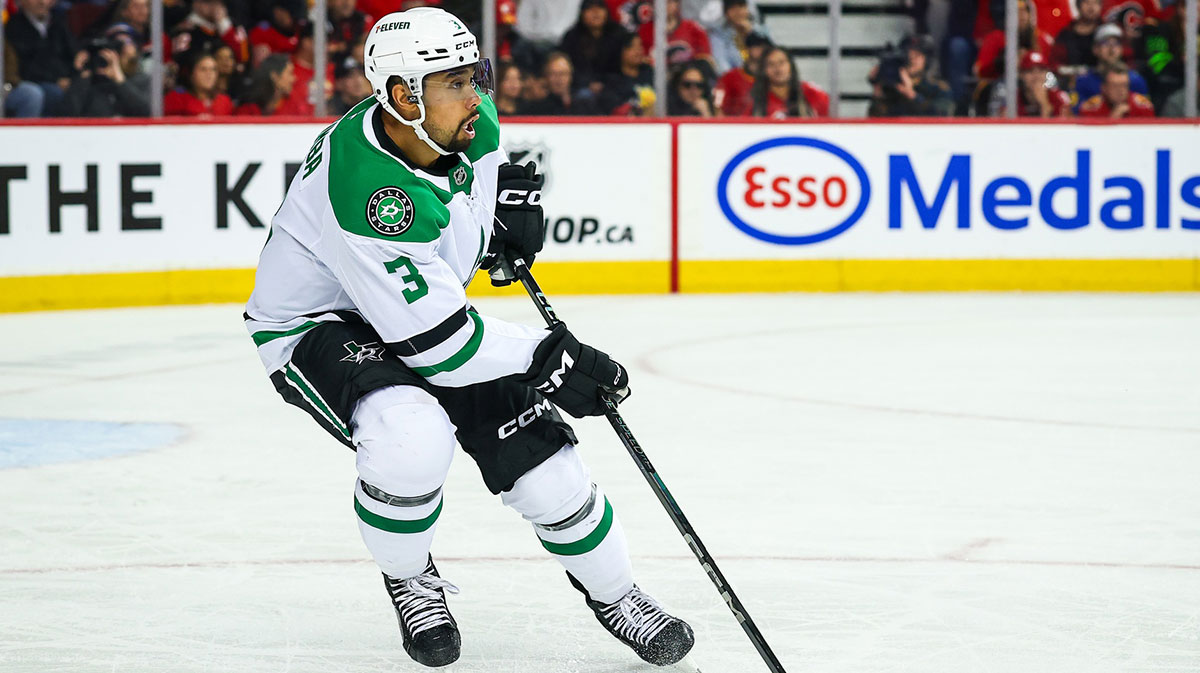 Dallas Stars defenseman Mathew Dumba (3) controls the puck against the Calgary Flames during the second period at Scotiabank Saddledome.