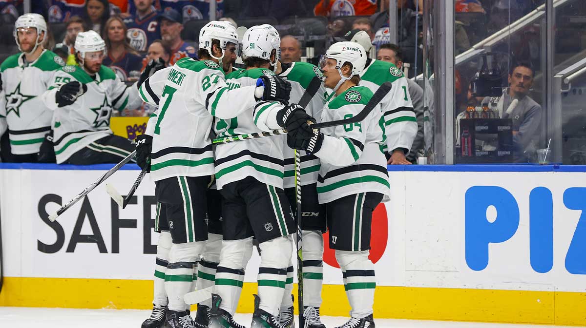 Dallas Stars left wing Mason Marchment (27) and center Mikael Granlund (64) and left wing Jason Robertson (21) and center Tyler Seguin (91) celebrates a goal scored by Robertson against the Edmonton Oilers during the second period in game four of the Western Conference Final of the 2025 Stanley Cup Playoffs at Rogers Place.