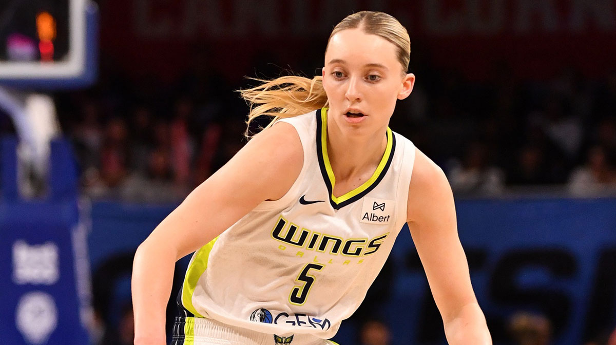 Dallas Wings guard Paige Bueckers (5) controls the ball during the second half against the Chicago Sky at the Wintrust Arena.