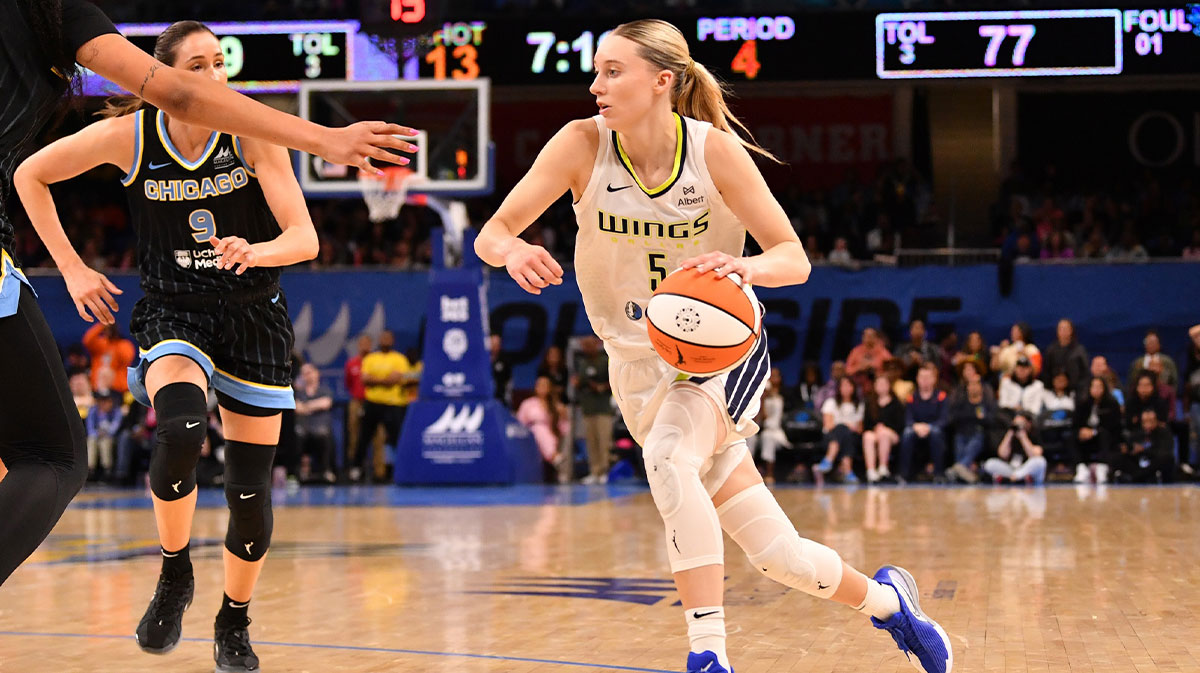 Dallas Wings guard Paige Bueckers (5) controls the ball during the second half against the Chicago Sky at the Wintrust Arena.