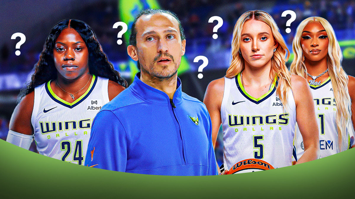 Wings Chris Koclanes looking serious in front, close-up image. In background, place Wings Arike Ogunbowale, DiJonai Carrington and Paige Bueckers all looking upset.