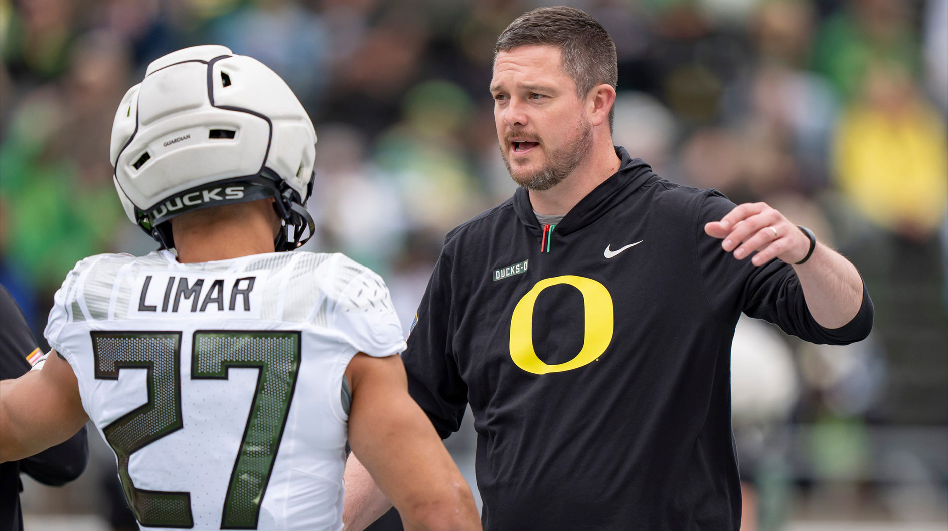 Oregon coach Dan Lanning greets Fighting Ducks running back Jayden Limar before the game as the Fighting Ducks face off against Mighty Oregon in the Oregon Ducks spring game on April 26, 2025, at Autzen Stadium in Eugene.