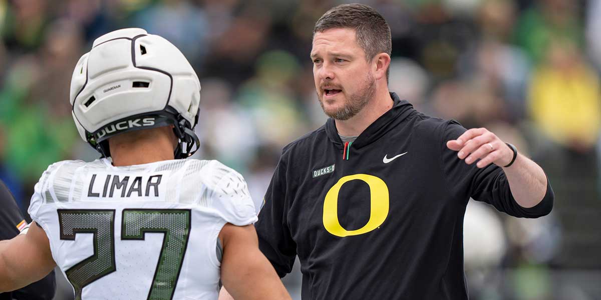Oregon coach Dan Lanning greets Fighting Ducks running back Jayden Limar before the game as the Fighting Ducks face off against Mighty Oregon in the Oregon Ducks spring game on April 26, 2025, at Autzen Stadium in Eugene.