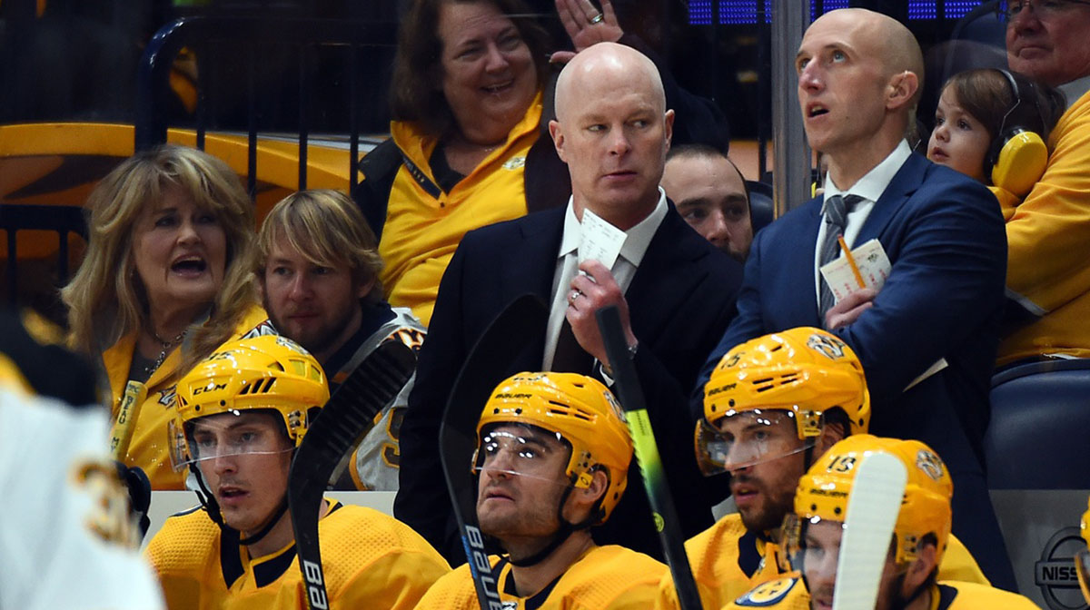 Nashville Predators head coach John Hynes talks with assistant coach Dan Muse during the first period against the Boston Bruins at Bridgestone Arena.