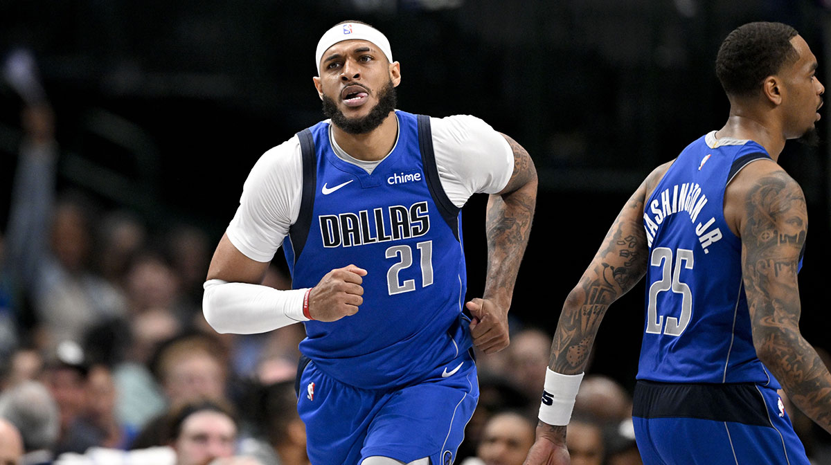 Dallas Mavericks center Daniel Gafford (21) and forward P.J. Washington (25) in action during the game between the Dallas Mavericks and the Brooklyn Nets at the American Airlines Center.