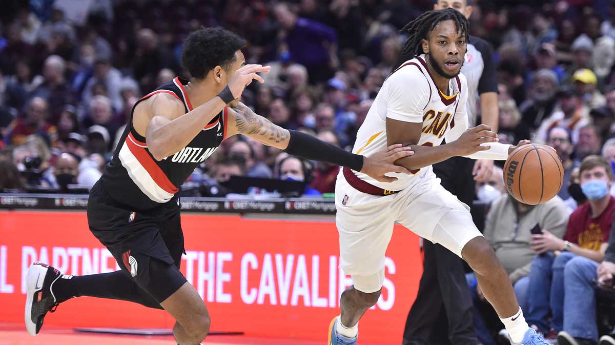 Cleveland Cavaliers guard Darius Garland (10) drives against Portland Trail Blazers guard Anfernee Simons (1) in the fourth quarter at Rocket Mortgage FieldHouse.