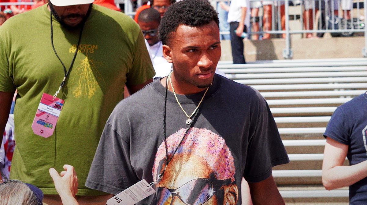 Aug 31, 2024; Columbus, OH, USA; Prolific Prep (Napa, California) combo guard and Ohio State basketball target Darryn Peterson watches OSU football warm up before the Buckeyes' 52-6 win over Akron.