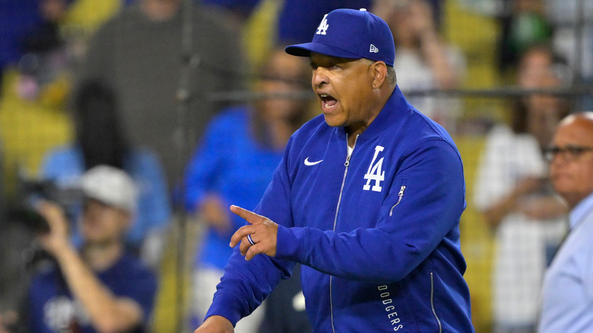 Los Angeles Dodgers manager Dave Roberts (30) yells at San Diego Padres manager Mike Shildt (8) after benches cleared in the eighth inning at Dodger Stadium.