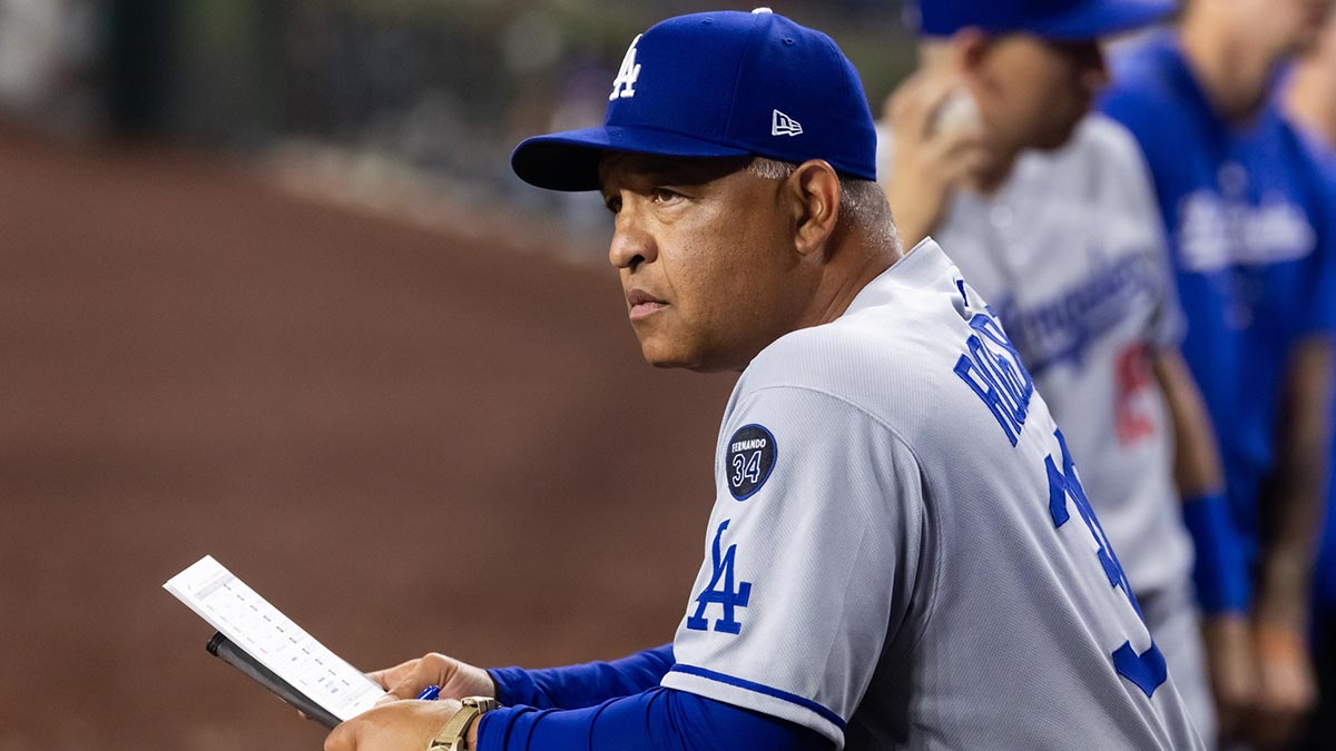 May 9, 2025; Phoenix, Arizona, USA; Los Angeles Dodgers manager Dave Roberts against the Arizona Diamondbacks at Chase Field. Mandatory Credit: Mark J. Rebilas-Imagn Images. Roberts sends kike hernandez to pitch for dodgers.