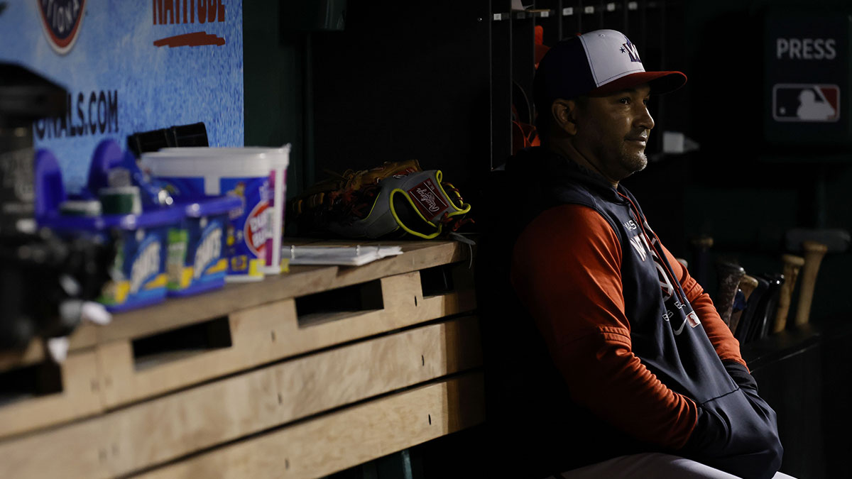 Washington Nationals manager Davey Martinez watches from the dugout against the Atlanta Braves during the seventh inning at Nationals Park.