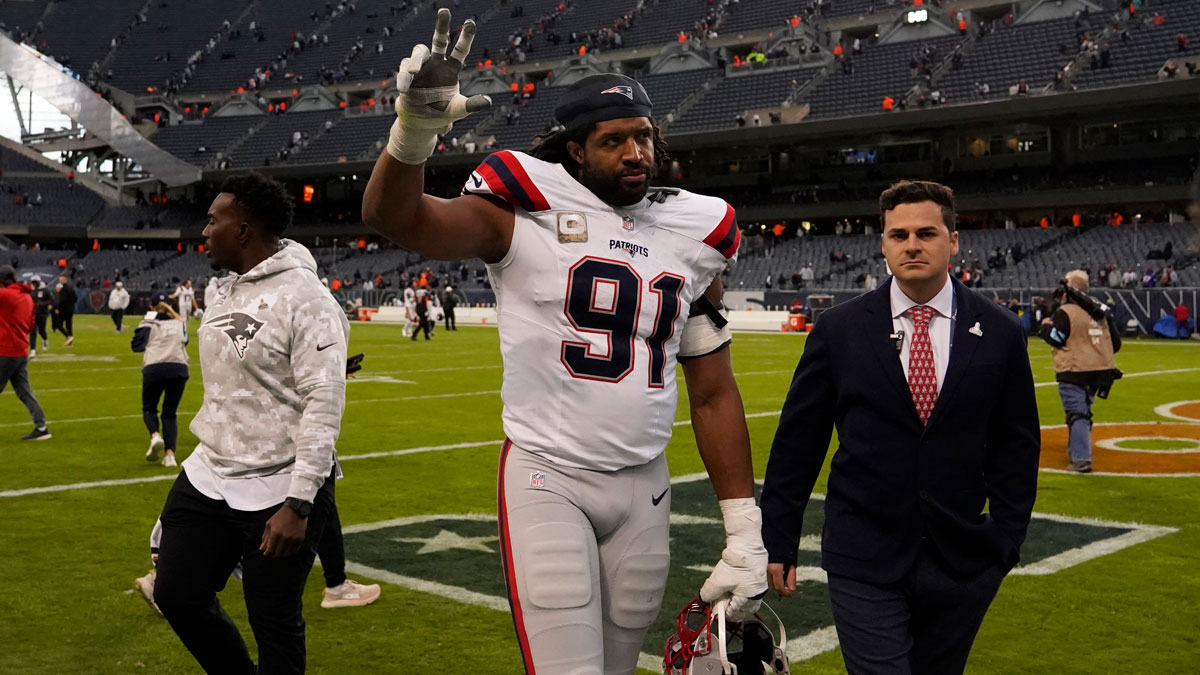 New England Patriots defensive end Deatrich Wise Jr. (91) celebrates the win against the Chicago Bears at Soldier Field.