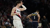Portland Trail Blazers forward Deni Avdija (8) celebrates scoring a three point basket during the second half against the Denver Nuggets at Moda Center.