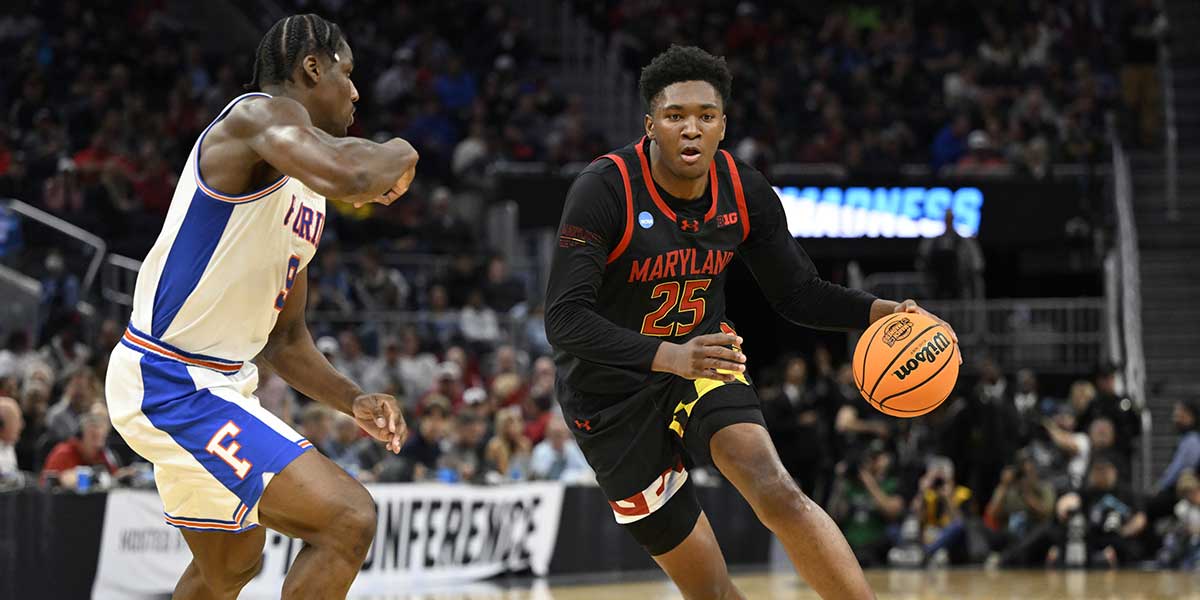 Maryland Terrapins center Derik Queen (25) dribbles down court past Florida Gators center Rueben Chinyelu (9) during the second half during a West Regional semifinal of the 2025 NCAA tournament at Chase Center.