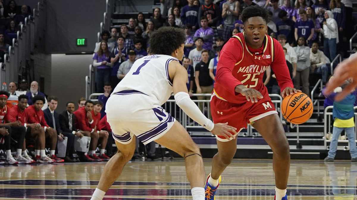 Northwestern Wildcats guard Jalen Leach (1) defends Maryland Terrapins center Derik Queen (25) during the first half at Welsh-Ryan Arena.