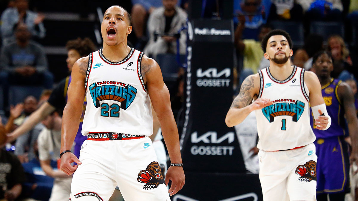 Memphis Grizzlies guard Desmond Bane (22) and guard Scotty Pippen Jr. (1) react during the second quarter against the Los Angeles Lakers at FedExForum.