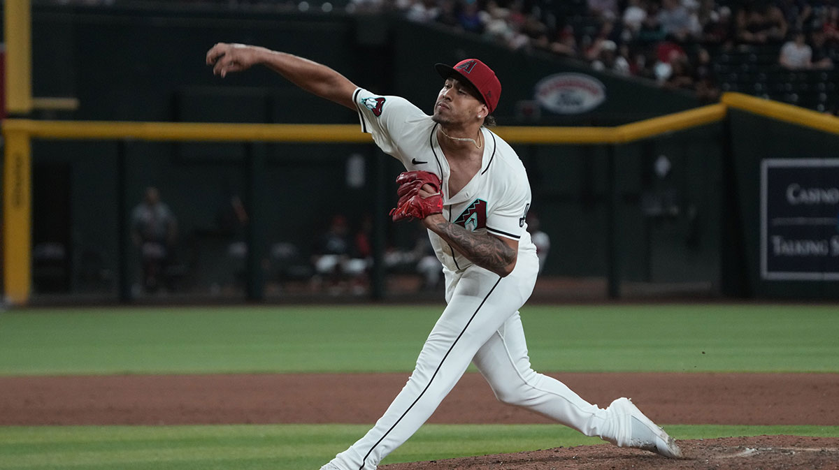 Arizona Diamondbacks pitcher Justin Martinez (63) throws against the Seattle Mariners in the ninth inning at Chase Field.