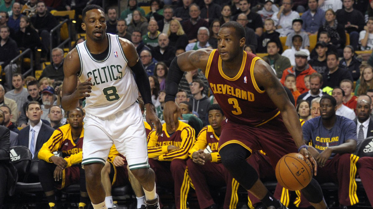 Cleveland Cavaliers shooting guard Dion Waiters (3) drives to the basket past Boston Celtics shooting guard Jeff Green (8) during the first half at TD Garden.
