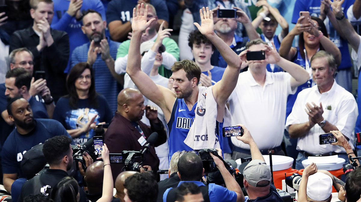 Dallas Mavericks forward Dirk Nowitzki (41) reacts after the game against the Phoenix Suns at American Airlines Center.