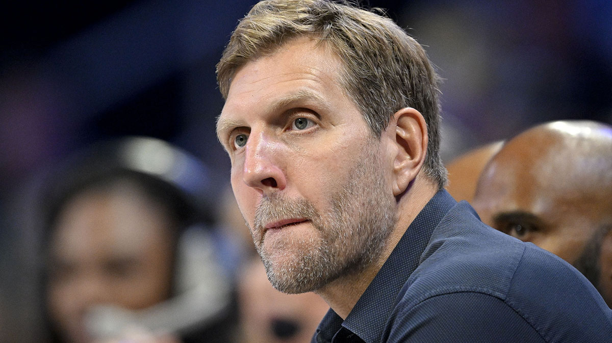 Former NBA player Dirk Nowitzki watches the game between the Dallas Wings and the Seattle Storm during the first half at College Park Center.