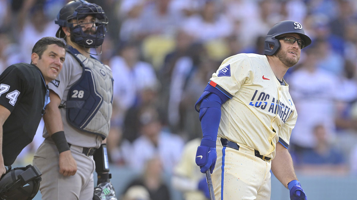 Los Angeles Dodgers third baseman Max Muncy (13) celebrates after crossing the plate on his second three-run home run in the fifth inning against the New York Yankees at Dodger Stadium.
