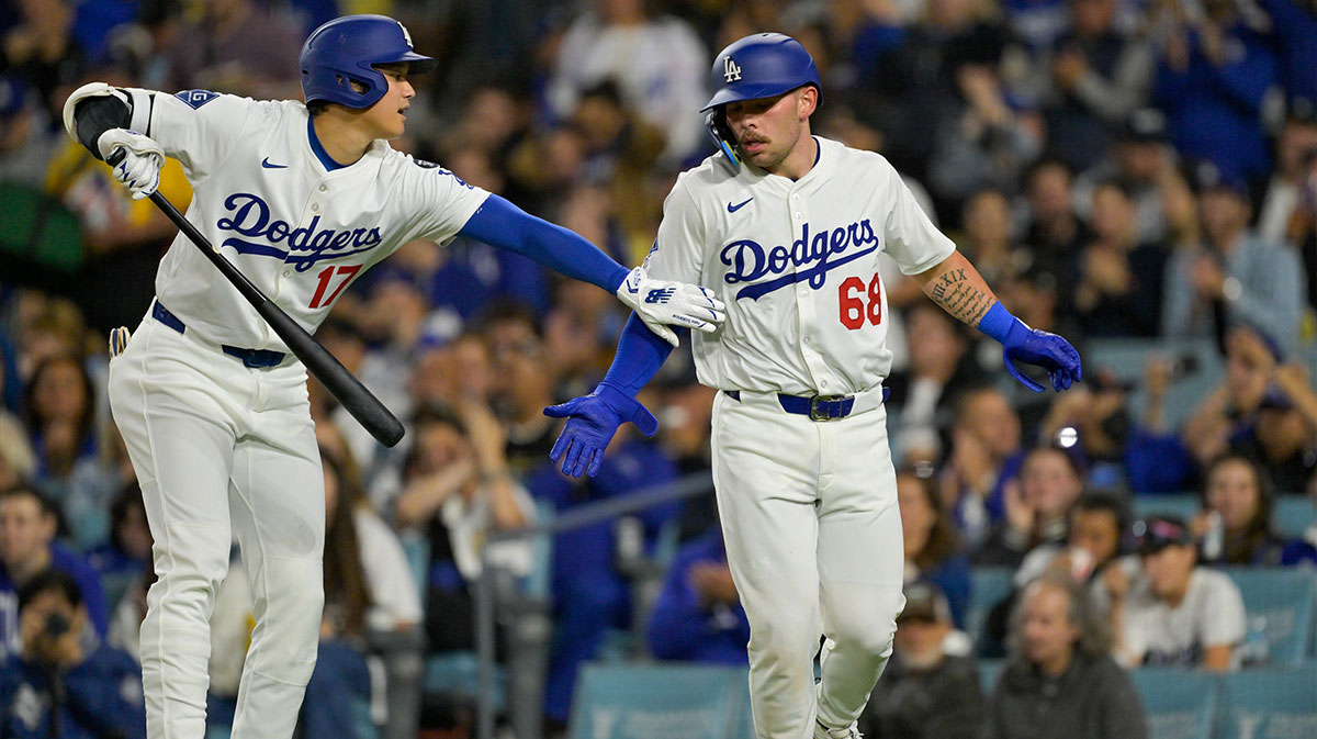 Los Angeles Dodgers catcher Dalton Rushing (68) celebrates with designated hitter Shohei Ohtani (17) after scoring a run against the Athletics during the third inning of the game at Dodger Stadium