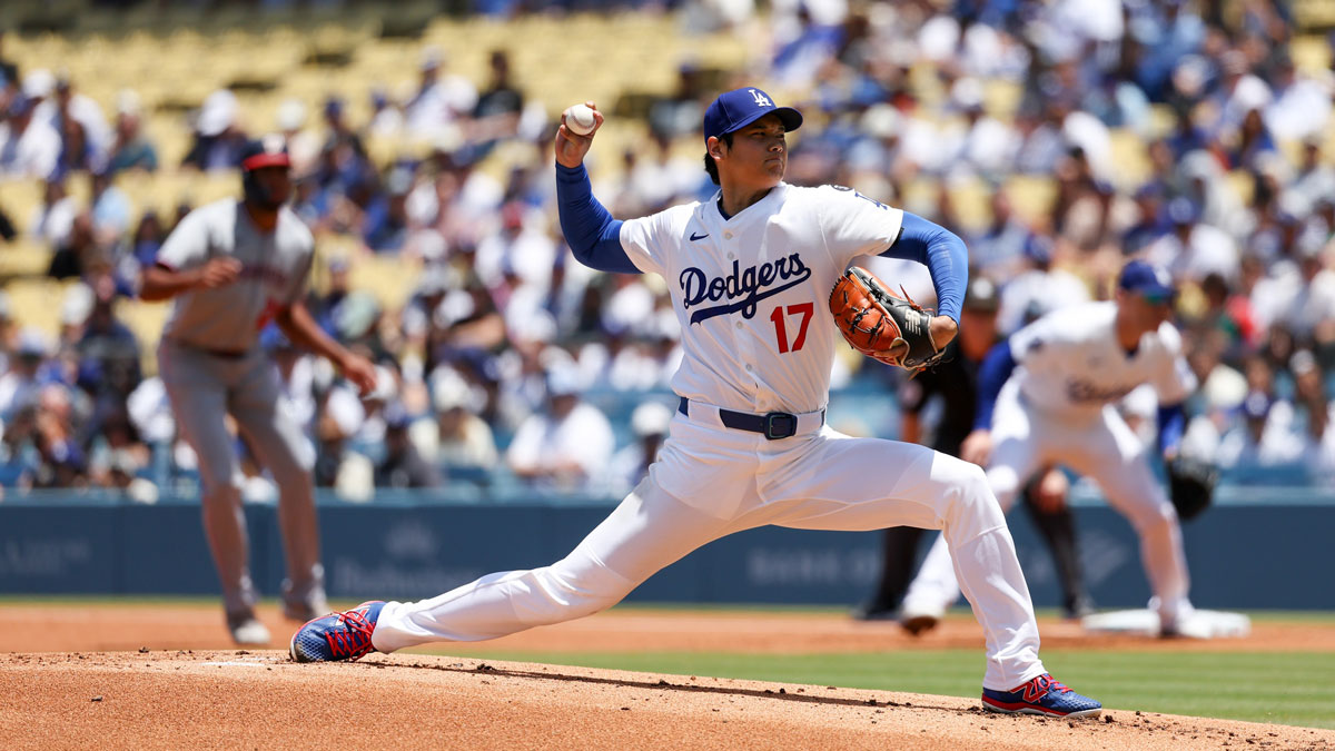 Los Angeles Dodgers two‑way player Shohei Ohtani (17) pitches the ball during the first inning against the Washington Nationals at Dodger Stadium.
