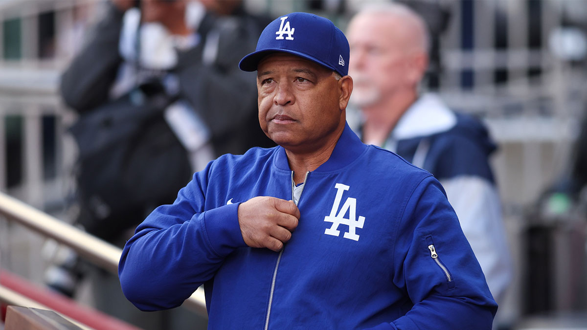 Los Angeles Dodgers manager Dave Roberts (30) in the dugout before a game against the Atlanta Braves at Truist Park.